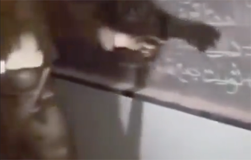 Thumbnail preview image for the video titled: Israeli soldiers mockingly "studying" Arabic in an abandoned school.