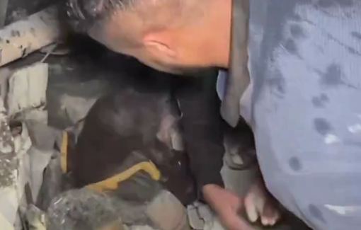 Thumbnail preview image for the video titled: Neighbors rescue victims from the rubble following Israeli bombing