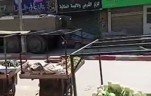 Thumbnail preview image for the video titled: An Israeli Eitan APC damages Palestinian cars in the center of Jenin