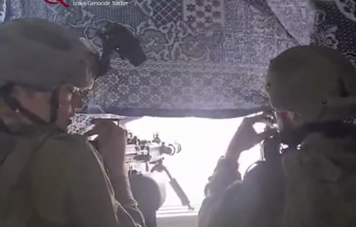 Thumbnail preview image for the video titled: Givati soldiers smoke while aiming out a window, a body they shot nearby