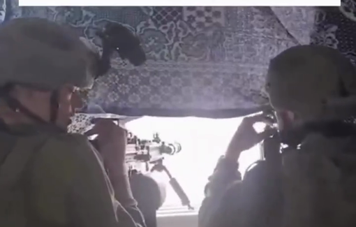 Thumbnail preview image for the video titled: Footage of IDF soldiers proudly presenting the sniping of a man