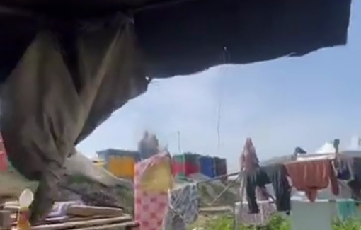 Thumbnail preview image for the video titled: Moment of an Israeli aristrike on displacement tents in Al-Mawasi