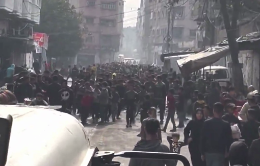 Thumbnail preview image for the video titled: Hundreds line up at bakery as Israel denied the entry of sustenance for nearly one month
