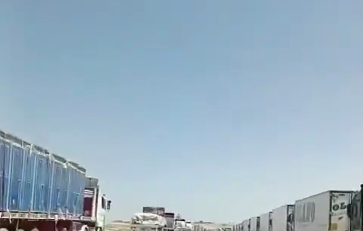 Thumbnail preview image for the video titled: Lines of aid trucks abandoned on the Egyptian side of Gaza border, blocked by Israel
