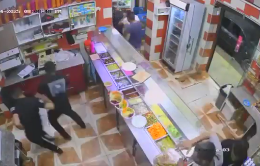 Thumbnail preview image for the video titled: CCTV captures Israeli forces firing a stun grenade in a restaurant in Beit Liqya