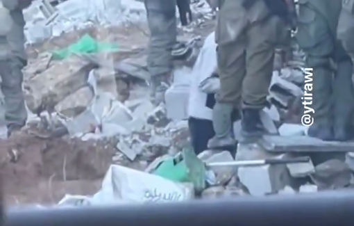 Thumbnail preview image for the video titled: An Israeli bulldozer operator in Gaza shows IDF using a Palestinian civilian as a human shield