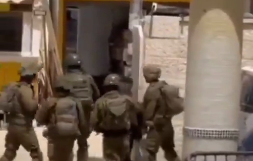 Thumbnail preview image for the video titled: Israeli special forces arrested a Palestinian child after raiding the Govermental Hospital of Jenin.