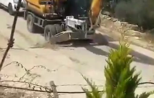Thumbnail preview image for the video titled: After demolishing two homes in Tuwani, an Israeli excavator dug up the village road—just for fun