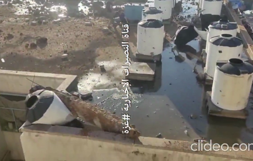 Thumbnail preview image for the video titled: Civilians try to recover victims blown from school roof by Israeli bombing