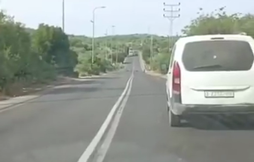 Thumbnail preview image for the video titled: Israeli settler militias blocking Wadi Qana Road by throwing stones on Palestinian vehicles