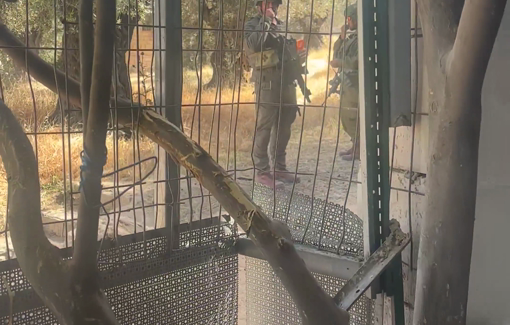 Thumbnail preview image for the video titled: Lawyer turned soldier who once defended settler attacker returns to intimidate activist Issa Amro at his home