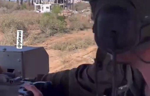 Thumbnail preview image for the video titled: Two French-Israeli soldiers spraying a house in Gaza with bullets