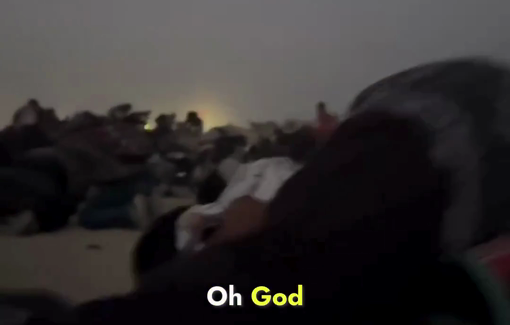 Thumbnail preview image for the video titled: Dawn footage shows aid seekers dropping to the ground under gunfire at a GHF site