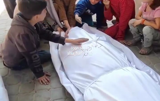 Thumbnail preview image for the video titled: Children mourn their father killed by an Israeli strike near Al-Rafii school