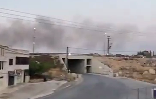 Thumbnail preview image for the video titled: Isarali settlers stormed the outskirts of the town of Beitin and set fire to houses and vehicles