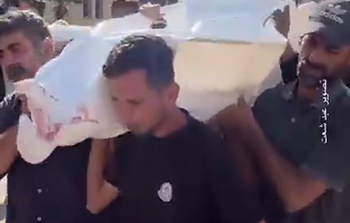 Thumbnail preview image for the video titled: In Gaza, Palestinians recite Eid Takbeers while carrying their killed relatives