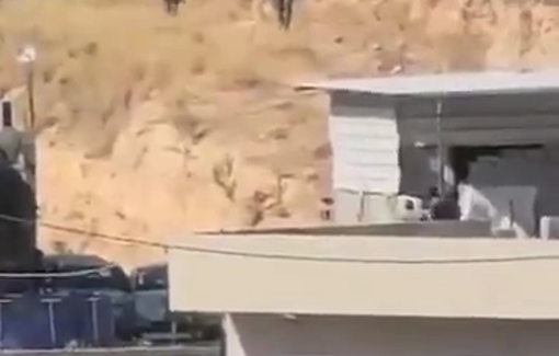 Thumbnail preview image for the video titled: Israeli settlers and soldiers attacking the village of Surif killing one and injuring eigth