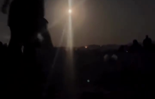 Thumbnail preview image for the video titled: Starved Palestinians gather at midnight for a chance to secure aid from a GHF site