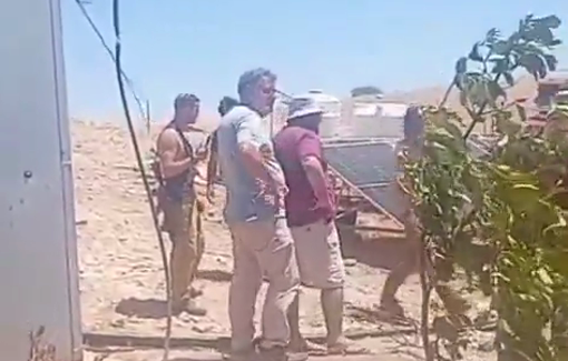 Thumbnail preview image for the video titled: Armed Israeli settlers harass Palestinian residents after raiding the village of Khirbet Al-Farisiyah