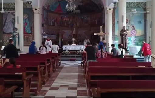 Thumbnail preview image for the video titled: Sounds of bombs in Gaza during the prayers at Holy Family Church