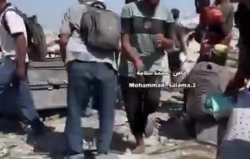 Thumbnail preview image for the video titled: Civilians carry an aid seeker killed at a GHF site