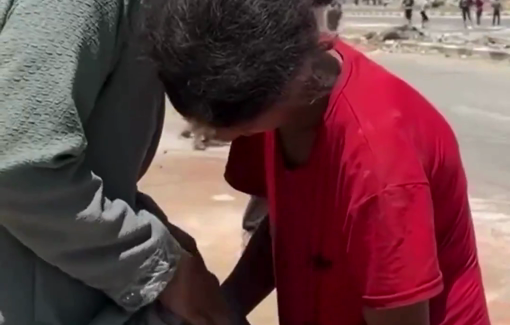 Thumbnail preview image for the video titled: Mother gave up on GHF, picks up spilled scraps off the ground