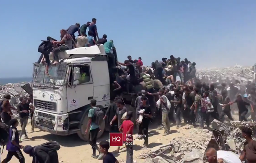 Thumbnail preview image for the video titled: Aid truck entering through Zikim being looted out of desperation