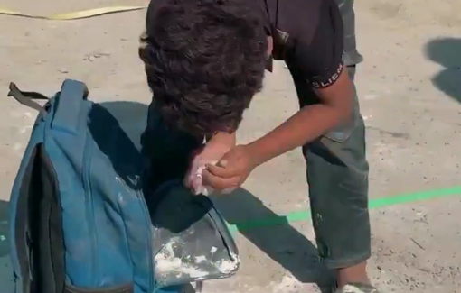 Thumbnail preview image for the video titled: Child collects leftover flour off the ground into his school bag