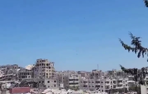 Thumbnail preview image for the video titled: Airdropped aid packages fall on displacement tents