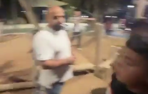Thumbnail preview image for the video titled: Israeli settlers attack Palestinians at a an amusement park in Al-Issawyia