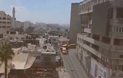 Thumbnail preview image for the video titled: Israeli soldiers abduct a Palestinian man and open fire indiscriminately during their raid on Ramallah