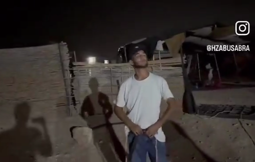 Thumbnail preview image for the video titled: During a raid in Duma, a settler is filmed urinating on Palestinians' homes and their sheep barns