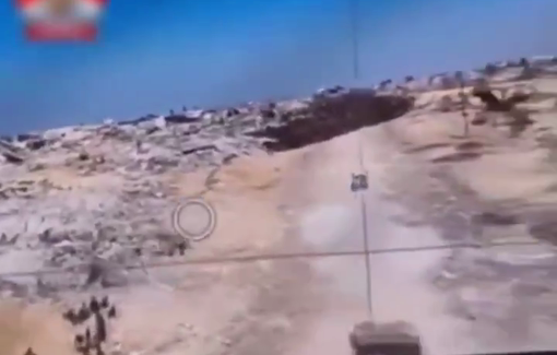 Thumbnail preview image for the video titled: Israeli drone shows thousands of Palestinians in Gaza desperately searching for food amid Israel’s stifling siege and destruction