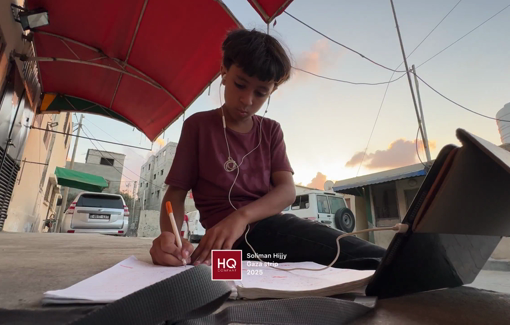 Thumbnail preview image for the video titled: Child continues his education at the door of the morgue