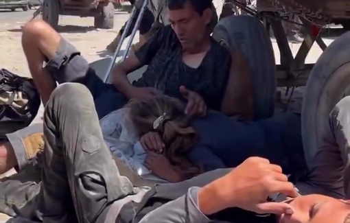 Thumbnail preview image for the video titled: Exhausted displaced children lie under the shade of their cart