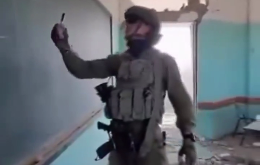 Thumbnail preview image for the video titled: An IDF soldier is doing a mock poetry class about Israeli genocide anthem "Harbu Darbu" in a destroyed school in Gaza