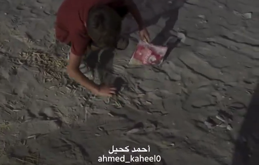 Thumbnail preview image for the video titled: Due to Israeli starvation campaign, child picks up scraps pf spilled pasta in northern Gaza