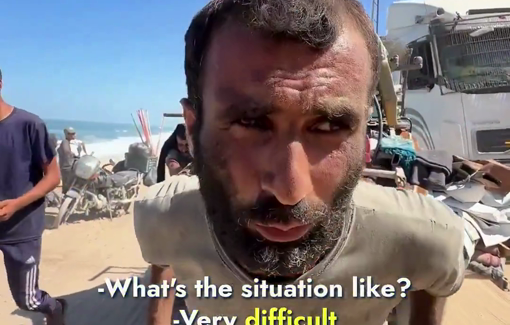 Thumbnail preview image for the video titled: Palestinian man drags a cart heavy with his family's essentials while being forcibly displaced by Israeli bombing of Gaza City