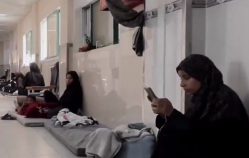 Thumbnail preview image for the video titled: Parents and their sick children sit in corridors in overcrowded Nasser hospital