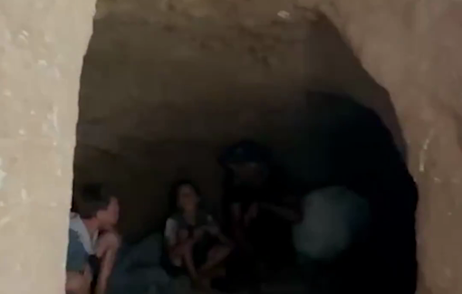 Thumbnail preview image for the video titled: Father forced to dig a cave to shelter his family after being forcibly displaced