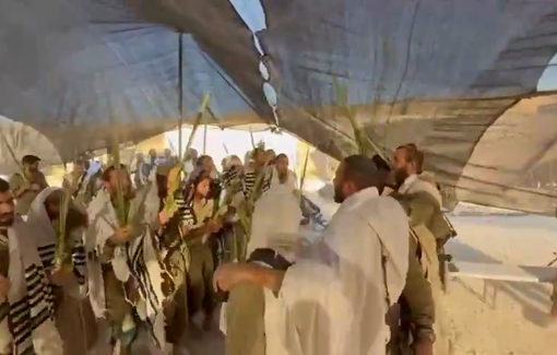 Thumbnail preview image for the video titled: IDF squad dances and chants for Sukkot in Gaza after killing and displacing thousands of people