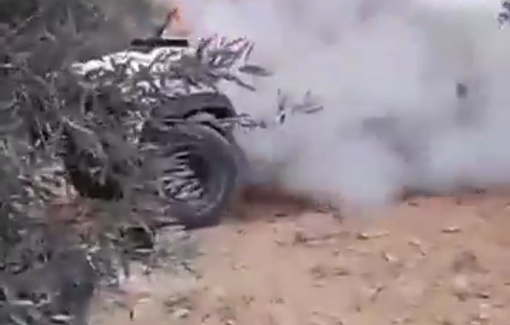 Thumbnail preview image for the video titled: Israeli settlers burn a number of vehicles during the attack on the village of Beita