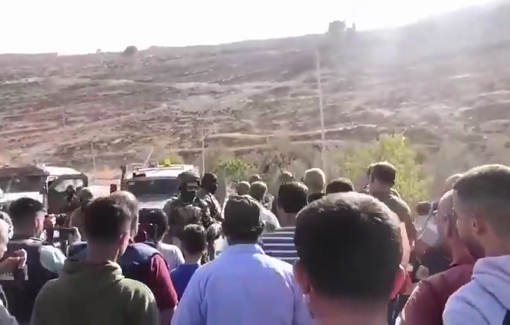 Thumbnail preview image for the video titled: Israeli forced preventing Palestinian farmers from reaching their olive groves near the town of Sa'ir