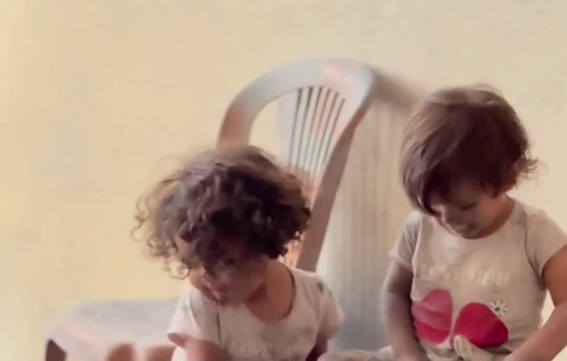 Thumbnail preview image for the video titled: Children returning to northern Gaza play with rubble