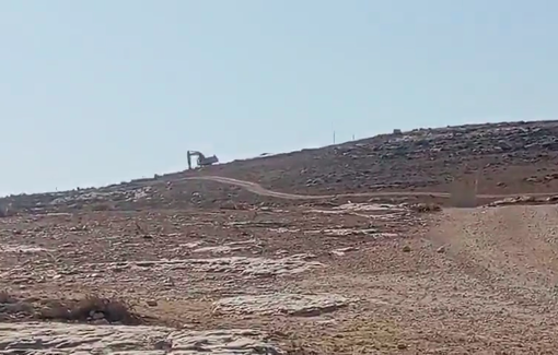 Thumbnail preview image for the video titled: Israeli settlers carving out a new settlement road between the villages of Shieb al-Butum and Al-Mufaqara