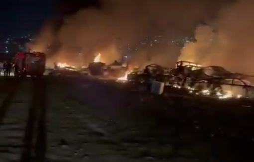 Thumbnail preview image for the video titled: A car-parts scrapyard? between Huwara and Odala, was set on fire by Israeli settlers