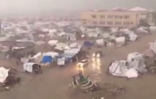 Thumbnail preview image for the video titled: Dozen of fragile tents flooding and collapsing under the storm in Gaza