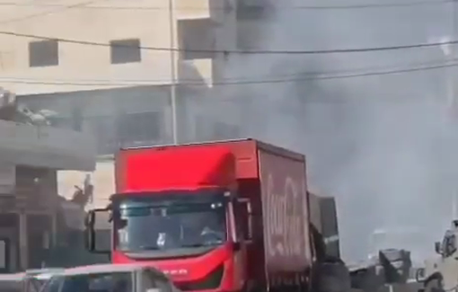 Thumbnail preview image for the video titled: Israeli forces fire tear gas during their raid on the town of Kafr Aqab and Qalandiya camp