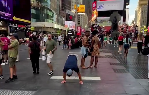 Thumbnail preview image for the video titled: War criminal Achya Ben Harush flexing his calisthenics moves in Times Square