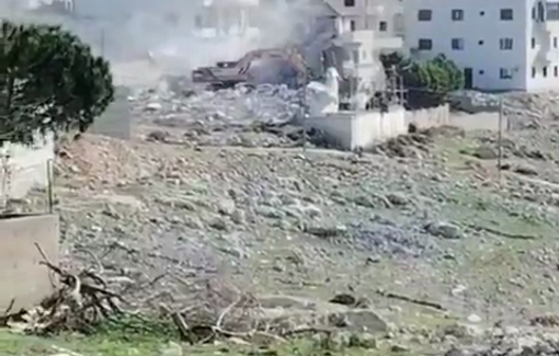 Thumbnail preview image for the video titled: Israeli bulldozers demolish a house in the Al-Taawan neighborhood of Nablus.